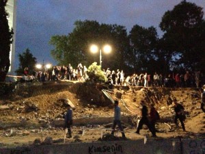 Night falls over the abandoned construction site